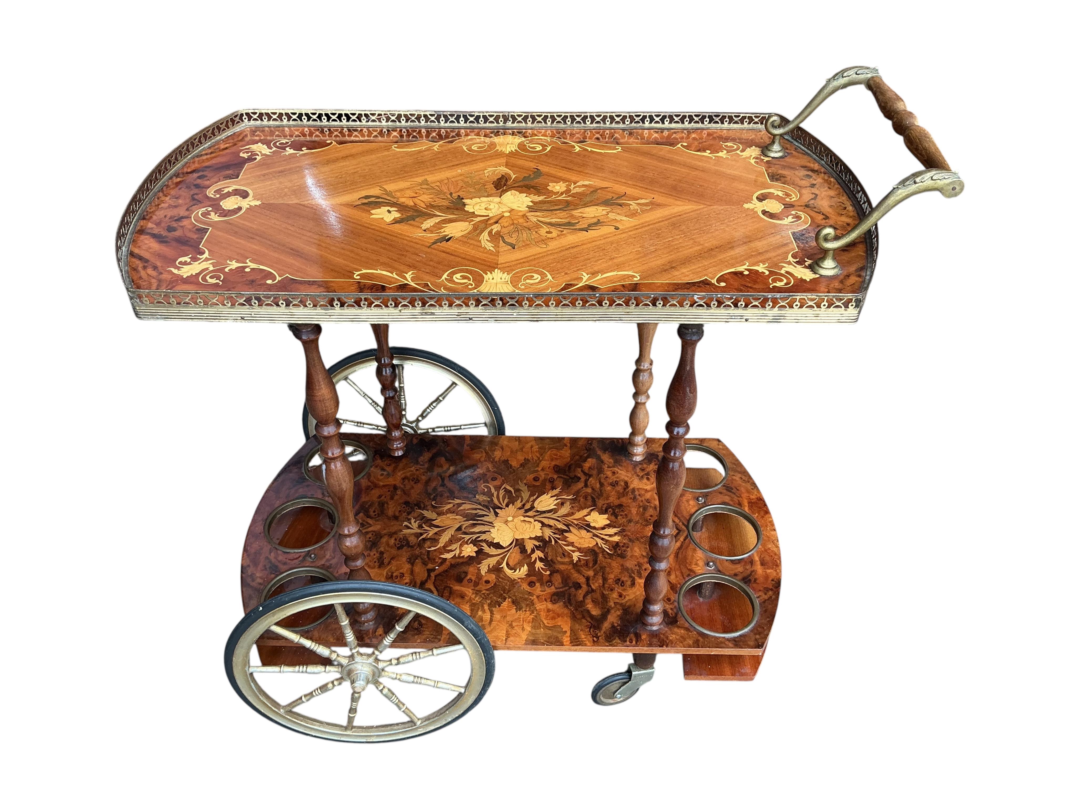 An Italian marquetry inlaid walnut two tier drinks trolley, width 79cm, depth 40cm, height 79cm